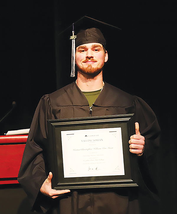 Photos submitted by Susan Kessler – Weston Von Meier holds the Valedictorian Award he received during the graduation service.
