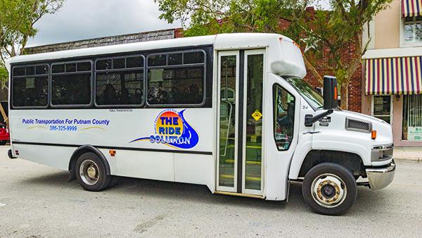 One of the Ride Solution buses drives down St. Johns Avenue in Palatka on Friday afternoon.