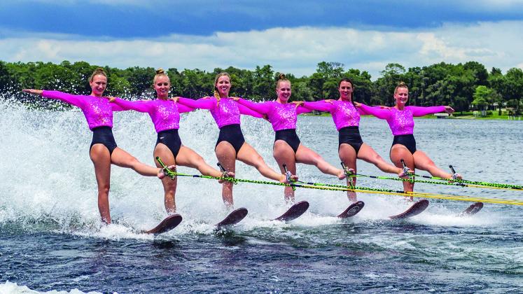 The Gatorland Water Ski Show Team practices maneuvers on the St. Johns River.
