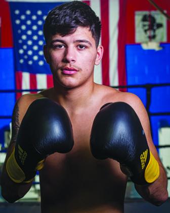 Crescent City High School senior Michael Garcia recently became a professional boxer on his 18th birthday.