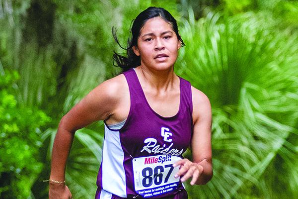 Crescent City's Yesenia Vasquez heads to the finish line to win the All-Putnam County girls cross country championship Wednesday at Ravine Gardens State Park. (FRAN RUCHALSKI / Palatka Daily News)