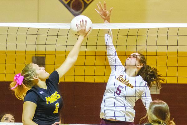 Crescent City’s Emily Cendrowska, right, works against Fort Meade’s Dani-Lyn Barnhill in the District 8-1A championship match Thursday. (FRAN RUCHALSKI / Palatka Daily News)