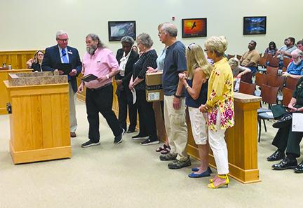 The One Book, One Putnam committee speaks to county commissioners Tuesday.