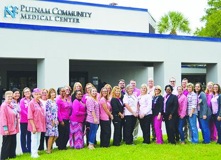 Hospital staff dress in pink to promote breast cancer awareness. 