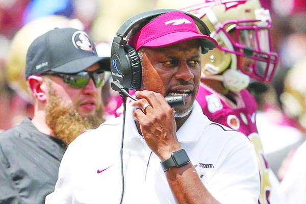 Willie Taggart was 0-5 against rivals Florida, Miami and Clemson. (GREG OYSTER / Special To The Daily News)