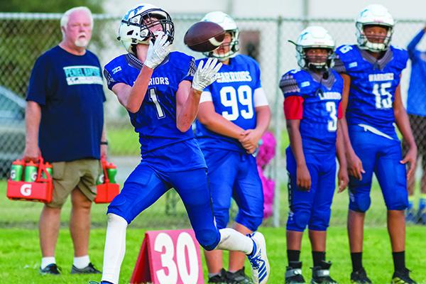 Freshman Wyatt Chapman (1) gives Peniel Baptist Academy hope for the future at wide receiver. (Daily News file photo)