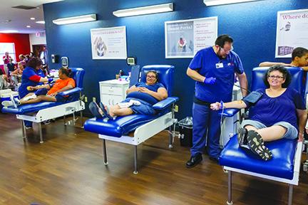 Local residents give blood at LifeSouth.