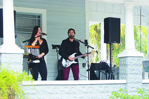 Marcel & Mariana Pineda perform during Palatka PorchFest Music Festival on Saturday.