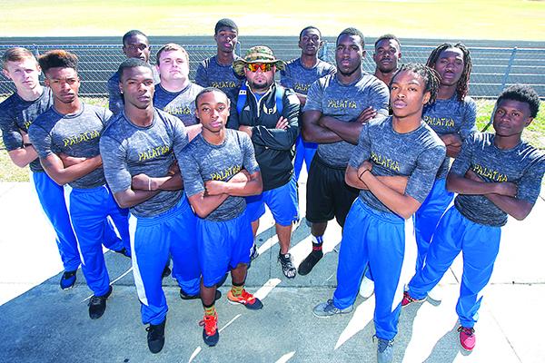 Coach Steve Gonzalez (middle) is surrounded by his 2016 Palatka High boys track team that won county, district and regional titles and finished third in the FHSAA 2A state championship meet. State champion Eron Carter is on the right of Gonzalez. (Daily News file photo)