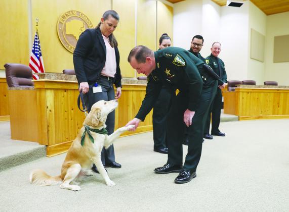 The Putnam County Sheriff's Office swears in three deputies and a therapy dog.
