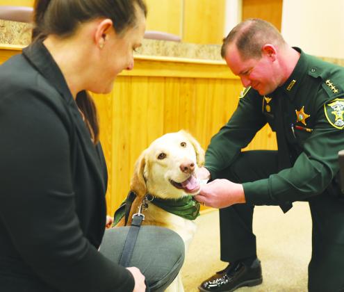 The Putnam County Sheriff's Office swears in three deputies and a therapy dog.