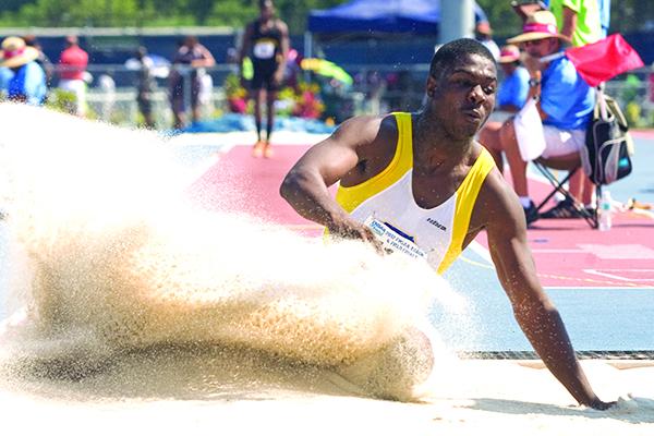 Palatka's Leroy Owens sticks the landing at the FHSAA 2A track championships, taking seventh in the triple jump. (Daily News file photo)