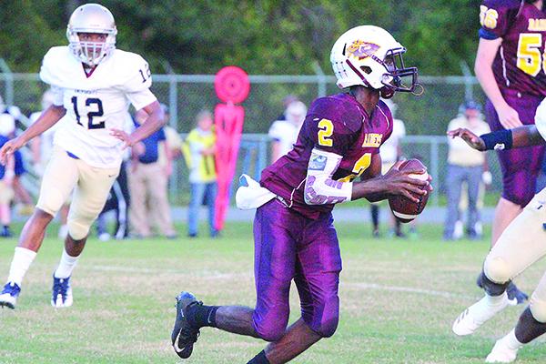 Crescent City quarterback Naykee Scott ran for 125 yards and threw for 97 more yards in leading the Raiders to an FHSAA Region 4-1A first-round triumph over Fort Meade. (Daily News file photo)