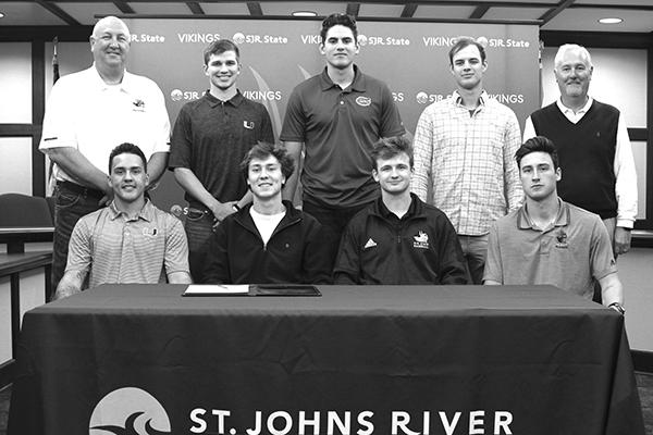 SJR State Athletic Director and head baseball coach Ross Jones and SJR State President Joe Pickens stand with Viking baseball players who recently signed national letters of intent to continue their baseball careers at the university level. First row, from left:  Michael Rosario, Stephen Halstead, August Haymaker and Nick Tripp. Second row from left, Jones, Jordan Dubberly, Franco Aleman, Jackson Spiller and Pickens. (Photo courtesy of SJR State)