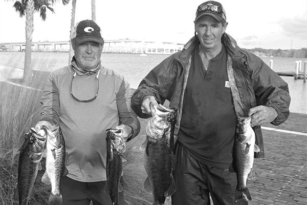 Stanley Hunt, left, and Wayne Alderman hold up winning fish (GREG WALKER / Special To The Daily News)