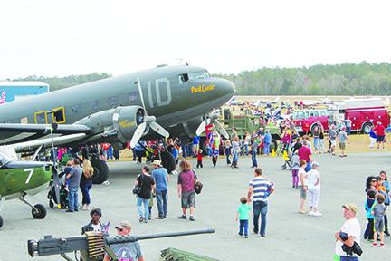 People enjoy last year's Fly-In and Car Show.