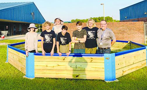 Luke, Jack and Mark Lewandowski built a gaming pit and bleachers to earn their Eagle Scout ranks.