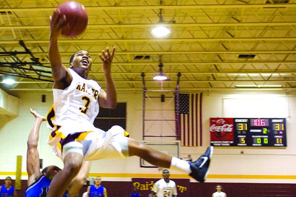 Crescent City's Jerrell Oxendine drives to the basket near the end of the first half of the game against Interlachen on Jan. 14, 2011. (Daily News file photo)