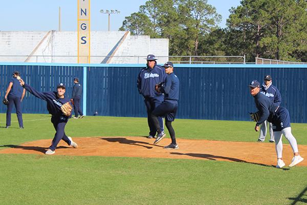 SJR State coach Ross Jones monitors the work of pitchers in the bullpen on a chilly Tuesday afternoon. (ANDY HALL / Palatka Daily News)