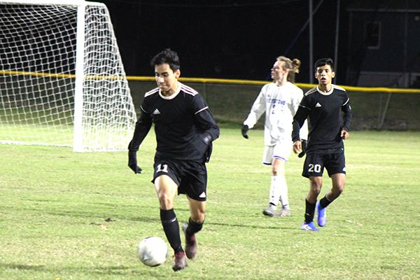 Crescent City’s Emmanuel Guerrero takes the ball up the field in the first half against Keystone Heights in the District 4-3A championship. (MARK BLUMENTHAL / Palatka Daily News)