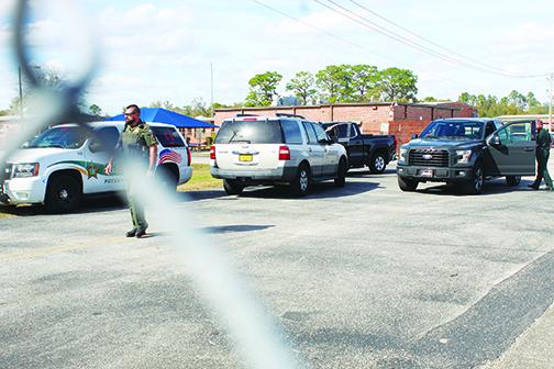 Jenkins Middle School is locked down Tuesday after weapons were found.