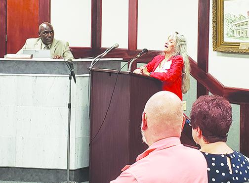 Kate McDaniel expresses frustration when speaking to the Palatka City Commission on Thursday about the possibility of the Palatka Art League losing the Tilghman House as a base of operations.