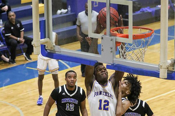 Wesley Roberts (12) and the Palatka High School boys basketball team make a return trip to Bishop Kenny High School tonight for the Region 1-4A first-round game. (GREG OYSTER / Special To The Daily News)