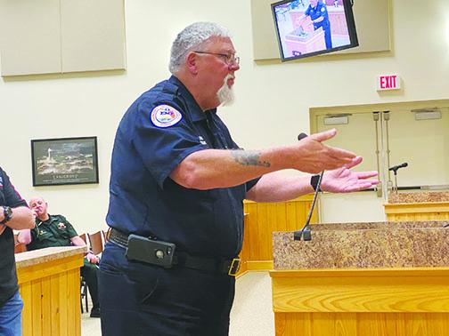 Former Putnam County firefighter John Chapman addresses the Board of County Commissioners at Tuesday’s workshop to discuss conditions local emergency workers face.
