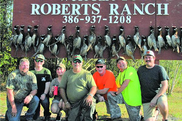 From left, hunters Terry French, Kaleb Hall, Staci Johns, George Johns, Tommy Baker, Mike Reynolds, Hunter Winkleman. (GREG WALKER / Special To The Daily News)