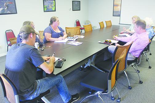 Members of the Palatka Tourist Destination Focus Group discuss how to bring more people to Palatka during a meeting Wednesday.