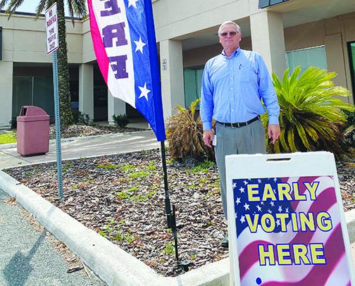 Putnam County Supervisor of Elections Charles Overturf III stands outside the early voting polling place in Palatka on Thursday morning.
