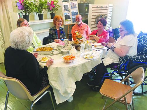 Palatka Art League members meet Monday to discuss the organization’s future at the Tilghman House, which has been the art league’s headquarters for 25 years.