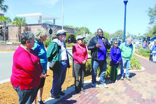 Mayor Terrill Hill speaks Saturday as the Palatk Trail Town Committee dedicates a set of kiosks to celebrate the city becoming a Trail Town.