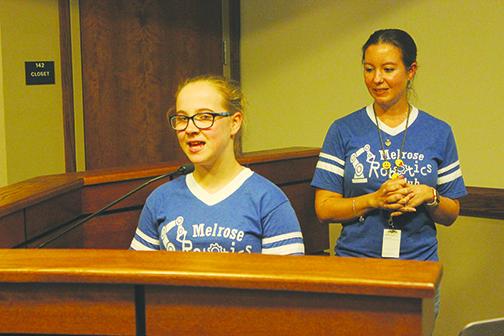Melrose Elementary School sixth-grader Jamie Dockery explains her favorite part of being on her school’s robotics team during Tuesday’s school board meeting.
