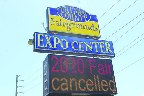 A sign in East Palatka informs passers-by the Putnam County Fair, which was supposed to begin today, has been canceled.