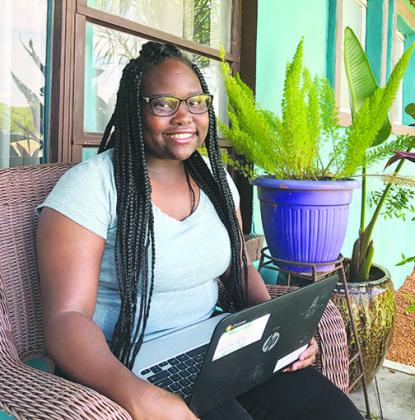 Zaria Long, a senior at Palatka High School, completes coursework Monday using a Chromebook provided to her by the Putnam County School District.