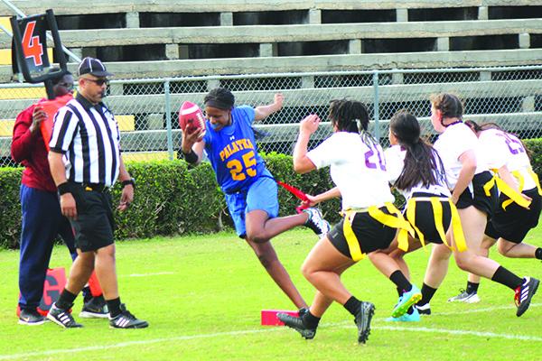 Rickeria Summers lunges for a Palatka touchdown just before halftime. Jordan Williams (20) leads Crescent City defenders. (ANDY HALL / Palatka Daily News)