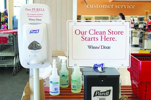 Winn-Dixie in Palatka rolled out new sanitization standards, which include offering hand sanitizer and disinfected carts to customers.