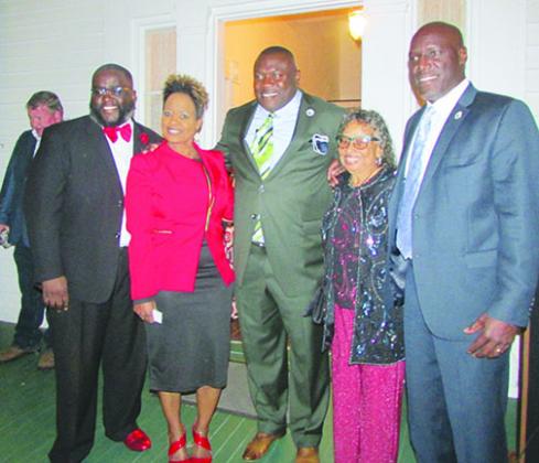 Palatka commissioners stand together last month during the Mayor’s Reception.