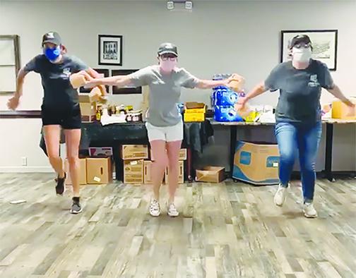C.P. Deli & More employees participate in the Restaurant Wars dance challenge.