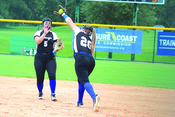Peniel Baptist Academy softball first baseman Dylana Lynn (20) is one of numerous county high school seniors who lost their final season due to the COVID-19 pandemic. (MARK BLUMENTHAL / Palatka Daily News)