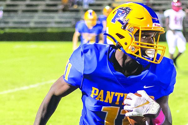 Wesley Roberts looks for running room during Palatka High’s game with Alachua Santa Fe last October. (Daily News file photo)