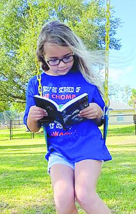 A local elementary school student participates in the Virtual Literacy Week.