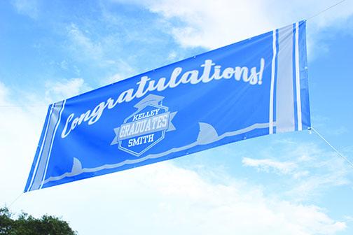Kelley Smith Elementary School flies a banner congratulating the school's fifith-graders.