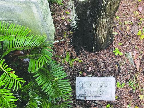Sheriff Peter Hagan’s grave is denoted by a simple stone marker beside a larger, Hagan family stone that carries no names at Peniel Church Cemetery.