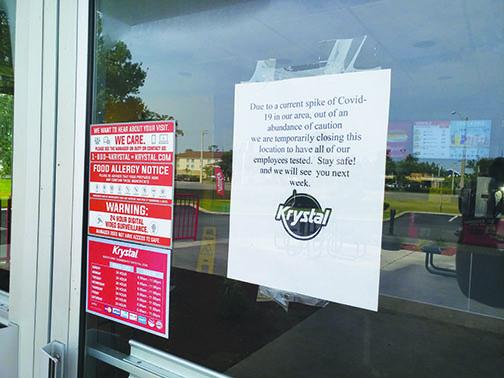A sign at the entrance to the Krystal restaurant on State Road 19 in Palatka informs visitors the business is temporarily closed due to a COVID-19 spike in the area and that all employees are being tested. Attempts to reach the Krystal corporate press office Thursday were unsuccessful.