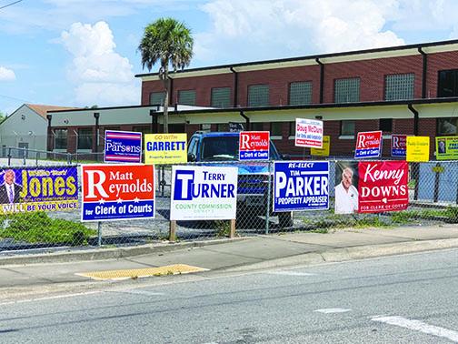 Candidate signs fill a parking lot across from the National Guard Armory near Moseley Avenue and Twigg Street in Palatka. Supervisor of Elections Charles Overturf III said issues about where candidates can place signs come up every election cycle.