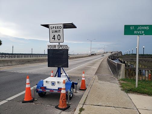 Traffic moves across Memorial Bridge on Wednesday afternoon. Law enforcement agencies will increase their presence on roadways during the Fourth of July holiday weekend.