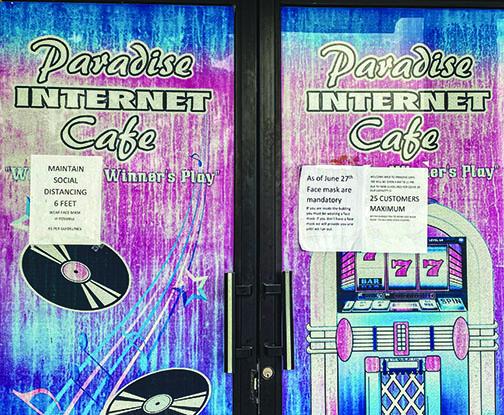 Paradise Internet Cafe in East Palatka mandates face masks and social distancing for customers to enter the business.