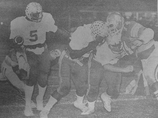Daily News file photo Clifton Reynolds follows his blockers to score a touchdown in the FHSAA 3A state championship game against Titusville in 1983. (Daily News file photo)